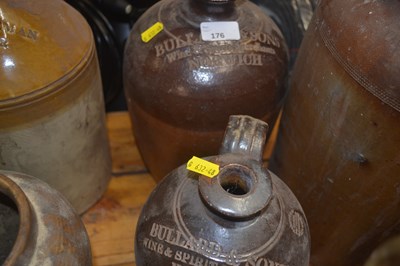 Lot 176 - Group of stoneware flagons, two for Bullard &...