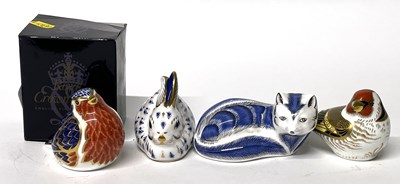 Lot 254 - Group of four Crown Derby paperweights...