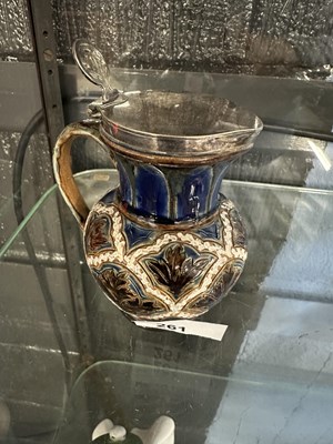 Lot 261 - Small 19th century Doulton ware jug with white...