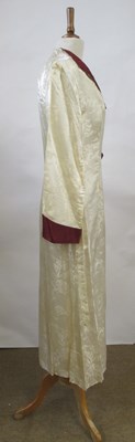 Lot 17 - An early 20th century cream and burgundy satin...