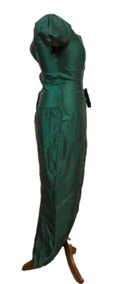 Lot 36 - A green satin cocktail dress, with short...