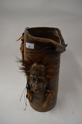 Lot 53 - ART POTTERY VASE WITH MASK DECORATION