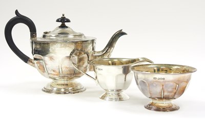 Lot 10 - An Art Deco three piece silver tea set of...