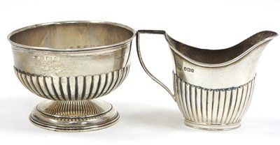 Lot 9 - A hallmarked silver pedestal sugar bowl, part...