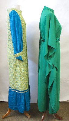 Lot 48 - Two 1970's dresses: including an emerald green...