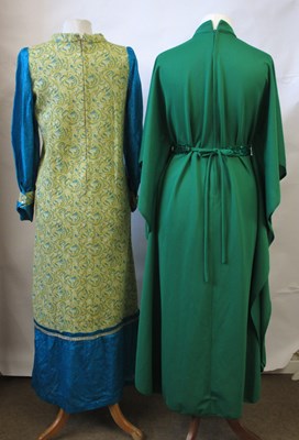 Lot 48 - Two 1970's dresses: including an emerald green...