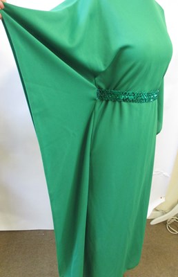 Lot 48 - Two 1970's dresses: including an emerald green...