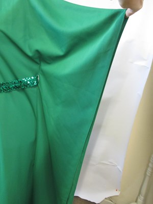 Lot 48 - Two 1970's dresses: including an emerald green...