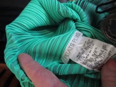 Lot 62 - Pleats Please: a green op-art plisse shift...