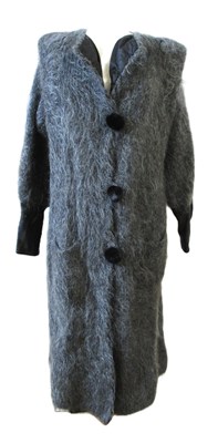 Lot 129 - Jeans Themes by Magic Design: a grey mohair,...