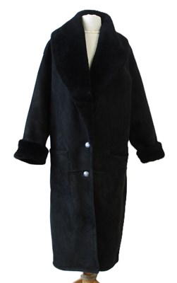 Lot 132 - A black sheepskin coat by Jane Norris, with...