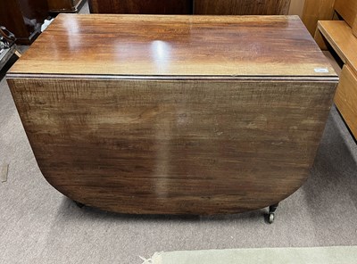 Lot 383 - A Victorian mahogany drop leaf dining table...