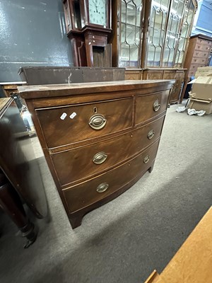 Lot 382 - A late Georgian mahogany bow front chest of...