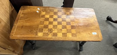 Lot 389 - A Victorian games table, the rectangular top...
