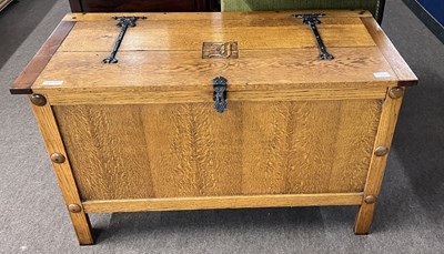 Lot 438 - A 20th Century oak coffer or blanket box...