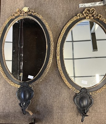 Lot 356 - A pair of 19th Century oval wall mirrors with...