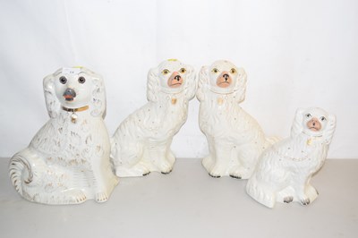 Lot 14 - A pair of 19th Century Staffordshire Spaniels...