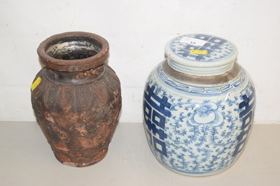 Lot 15 - A blue and white ginger jar together with a...