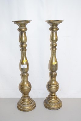 Lot 25 - A pair of reproduction gilt wood candlestands