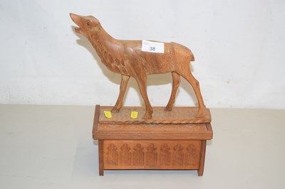 Lot 38 - A carved wooden model of a deer and a...