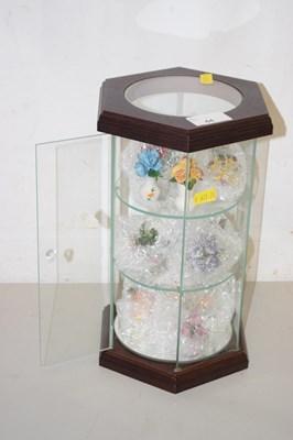 Lot 44 - A display cabinet containing a collection of...