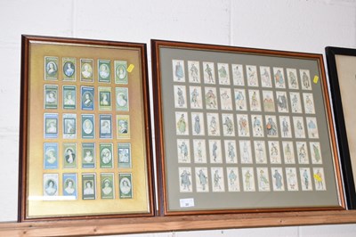 Lot 30 - A framed group of John Player characters from...