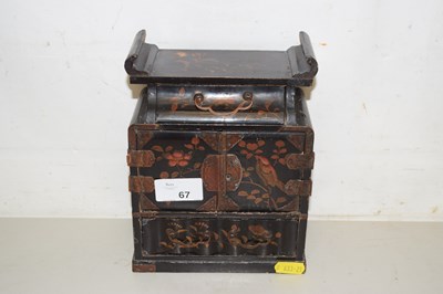 Lot 67 - A small Japanese black lacquered table top...