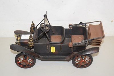 Lot 72 - A metal model of a vintage motor car