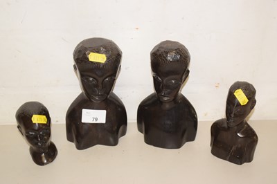 Lot 79 - A group of four African hardwood busts