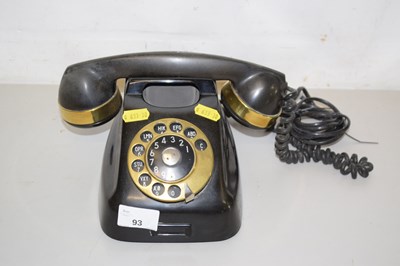 Lot 93 - A vintage black plastic and brass mounted...