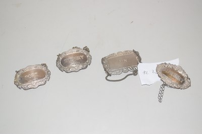 Lot 118 - A group of three modern silver decanter labels...