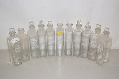 Lot 154 - Eleven small flat sided chemists jars