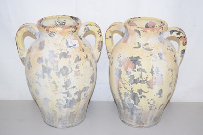 Lot 156 - A pair of painted double handled vases