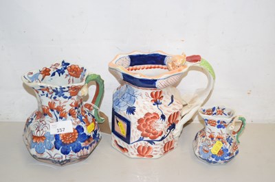 Lot 157 - Two Masons ironstone jugs and another similar