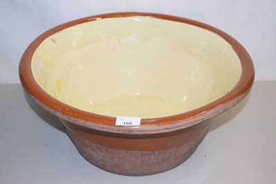 Lot 166 - A large terracotta glazed Dairy bowl
