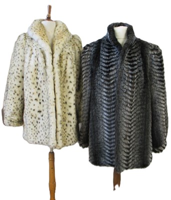 Lot 152 - Two faux fur coats, sizes 12 and 18, (2)