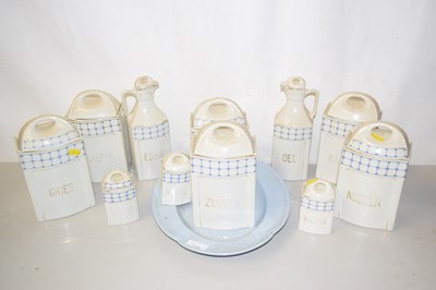 Lot 219 - A set of continental porcelain kitchen storage...