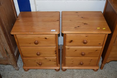 Lot 242 - A pair of modern pine three drawer bedroom chests