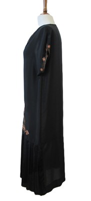 Lot 9 - An early 20th century shift dress, with v-neck...