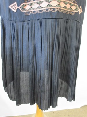 Lot 9 - An early 20th century shift dress, with v-neck...