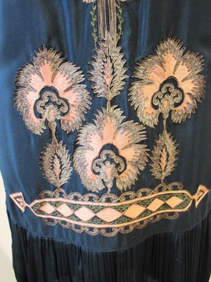 Lot 9 - An early 20th century shift dress, with v-neck...