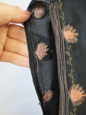 Lot 9 - An early 20th century shift dress, with v-neck...