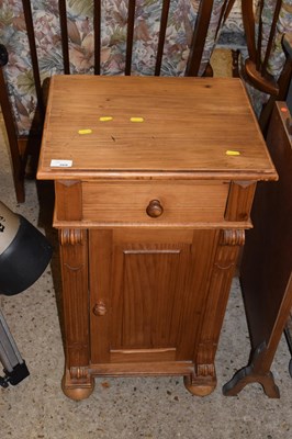 Lot 269 - A pine bedside cabinet