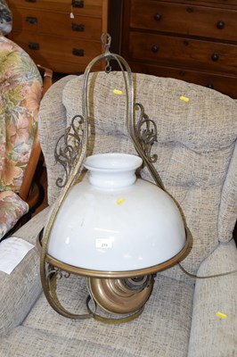 Lot 279 - A brass framed hanging oil lamp with opaque...