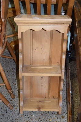 Lot 286 - A narrow pine wall shelf