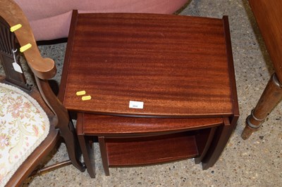 Lot 304 - A nest of three retro tables