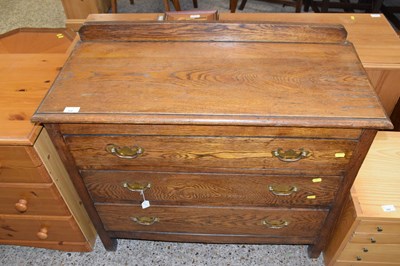 Lot 308 - An early 20th Century oak three drawer chest