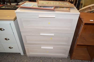Lot 312 - Modern light wood finish three drawer chest