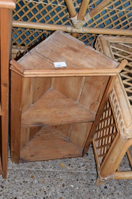 Lot 315 - A small pine corner cabinet
