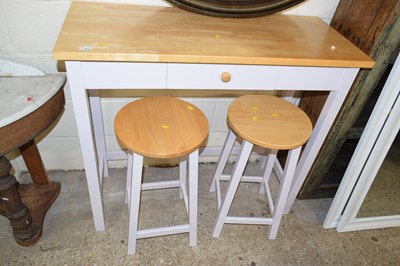 Lot 339 - A modern light wood kitchen table and two stools